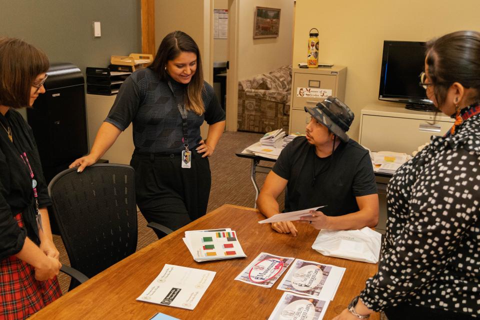 A Museum of the Cherokee People rebranding meeting includes, from left, Manager of External Affairs and Communications Anna Chandler, Director of Education Dakota Brown (Eastern Band of Cherokee Indians), artist and founder of Buffalotown Clothing Luke Swimmer (EBCI), and Designer Tyra Maney (EBCI, Diné).