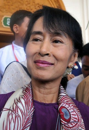 Myanmar opposition leader Aung San Suu Kyi, pictured on May 2, after attending a session at the lower house of parliament in Naypyidaw. Suu Kyi will travel overseas next week for the first time in more than two decades to attend an economic forum in Bangkok, according to her party