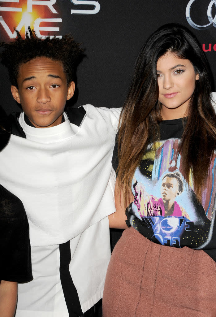 Jaden with his arm around Kylie's shoulder