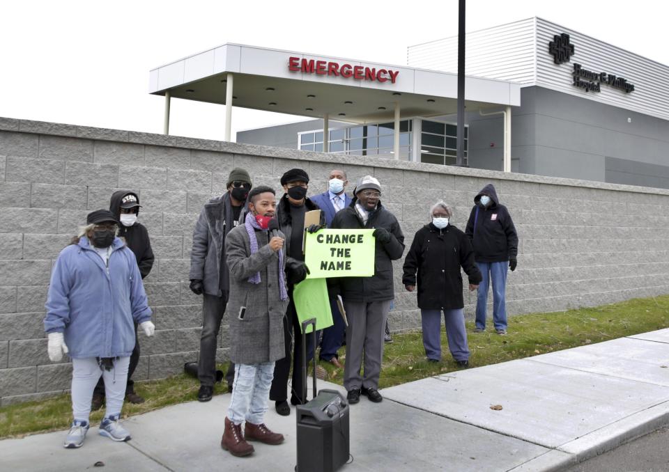 Missouri state Rep. Rasheen Aldridge leads a media event and rally outside the new Homer G. Phillips Memorial medical facility on Jefferson and Cass avenues, Saturday, Nov. 13, 2021, in St. Louis. The original five-story, 600-bed Homer G. Phillips Hospital in the Ville neighborhood was shuttered in 1979. But some people see the new name as an affront to the original, which is a recognized historic landmark. (Hillary Levin/St. Louis Post-Dispatch via AP)