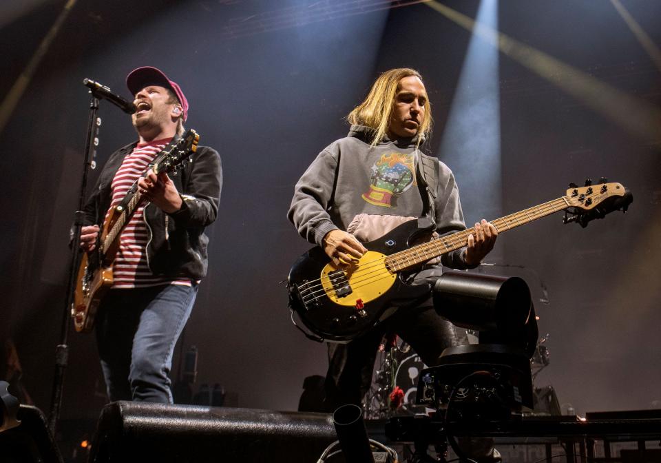 Patrick Stump (left) and Pete Wentz at the Fall Out Boy show at PPG Paints Arena.