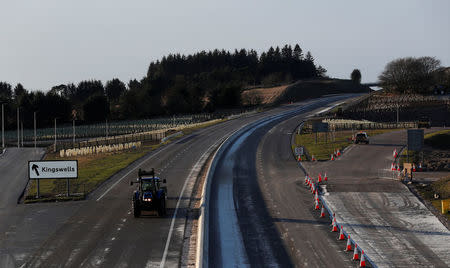 FILE PHOTO: Construction takes place on the Western Peripheral Route in Aberdeen, Scotland, Britain January 17, 2018. REUTERS/Russell Cheyne /File Photo