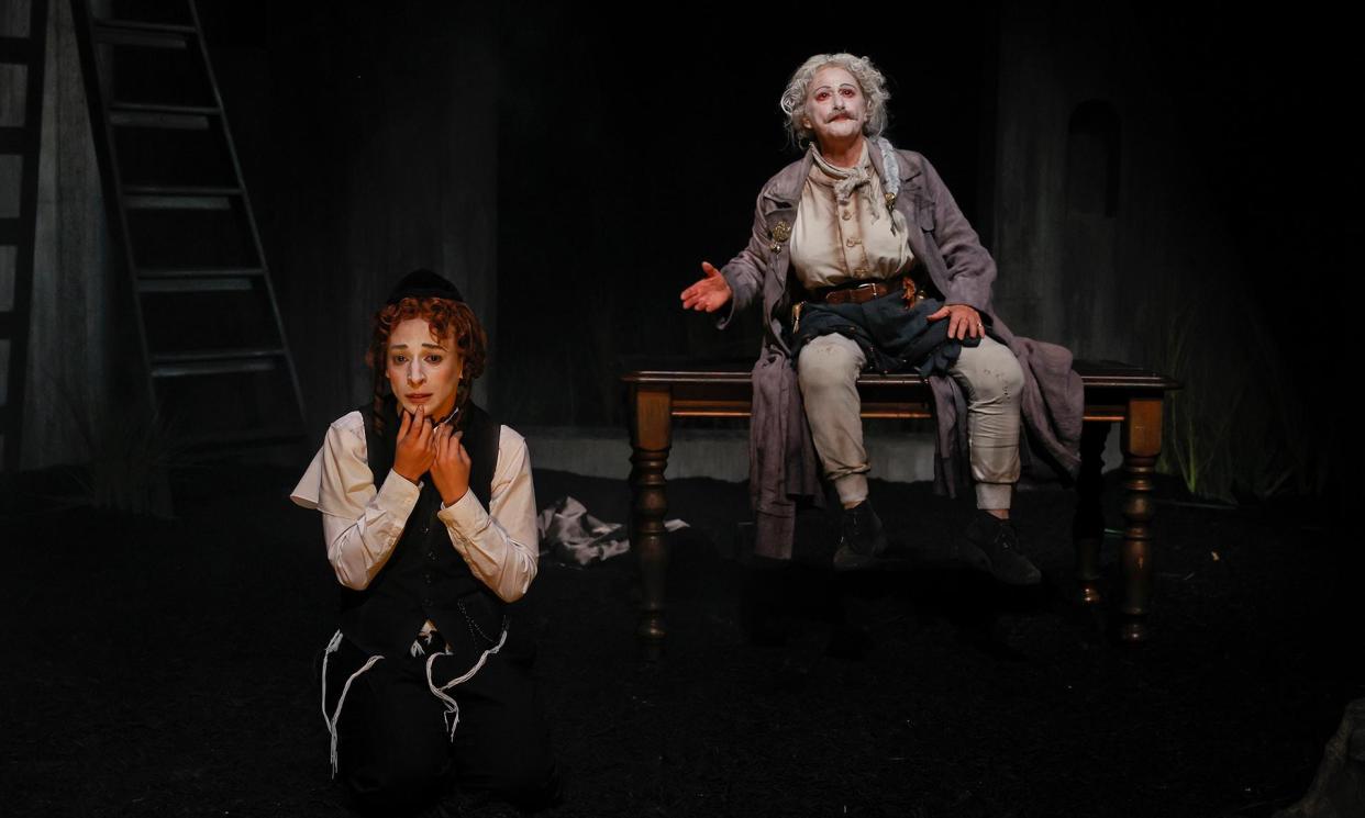<span>Amy Hack as Yentl/Anshl and Evelyn Krape as the yeytser ho’re, ‘a character not found in Singer’s original, and yet it feels totally requisite, a superb theatrical coup’.</span><span>Photograph: Jeff Busby/The Guardian</span>