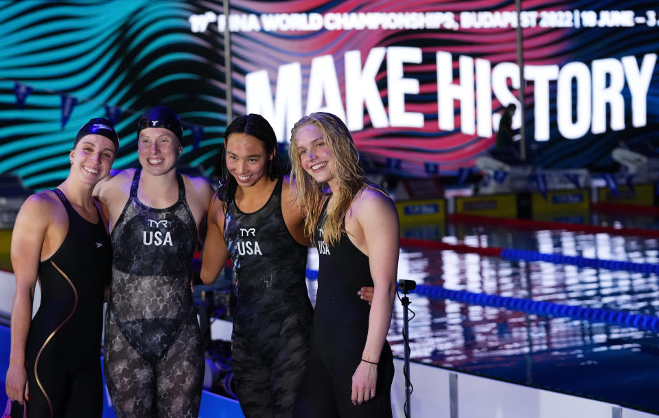 Team of the United States celebrates winning the women's 4x100m medley relay at the 19th FINA World Championships in Budapest, Hungary, Saturday, June 25, 2022. (AP Photo/Petr David Josek)