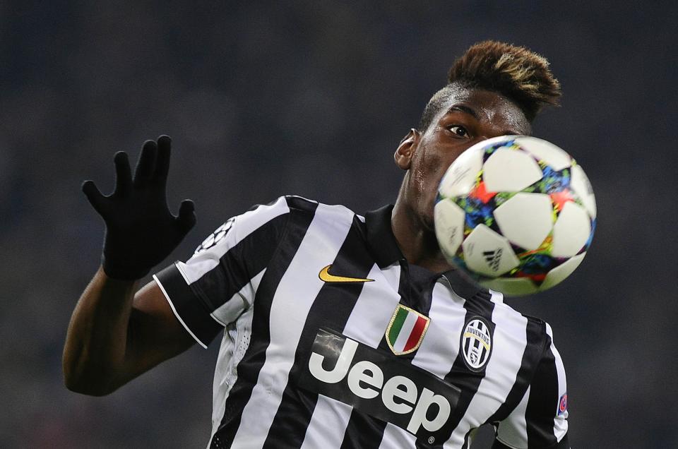 Juventus' Paul Pogba controls the ball during the Champions League round of 16 first leg soccer match against Borussia Dortmund at the Juventus stadium in Turin February 24, 2015. REUTERS/Giorgio Perottino (ITALY - Tags: SPORT SOCCER TPX IMAGES OF THE DAY)