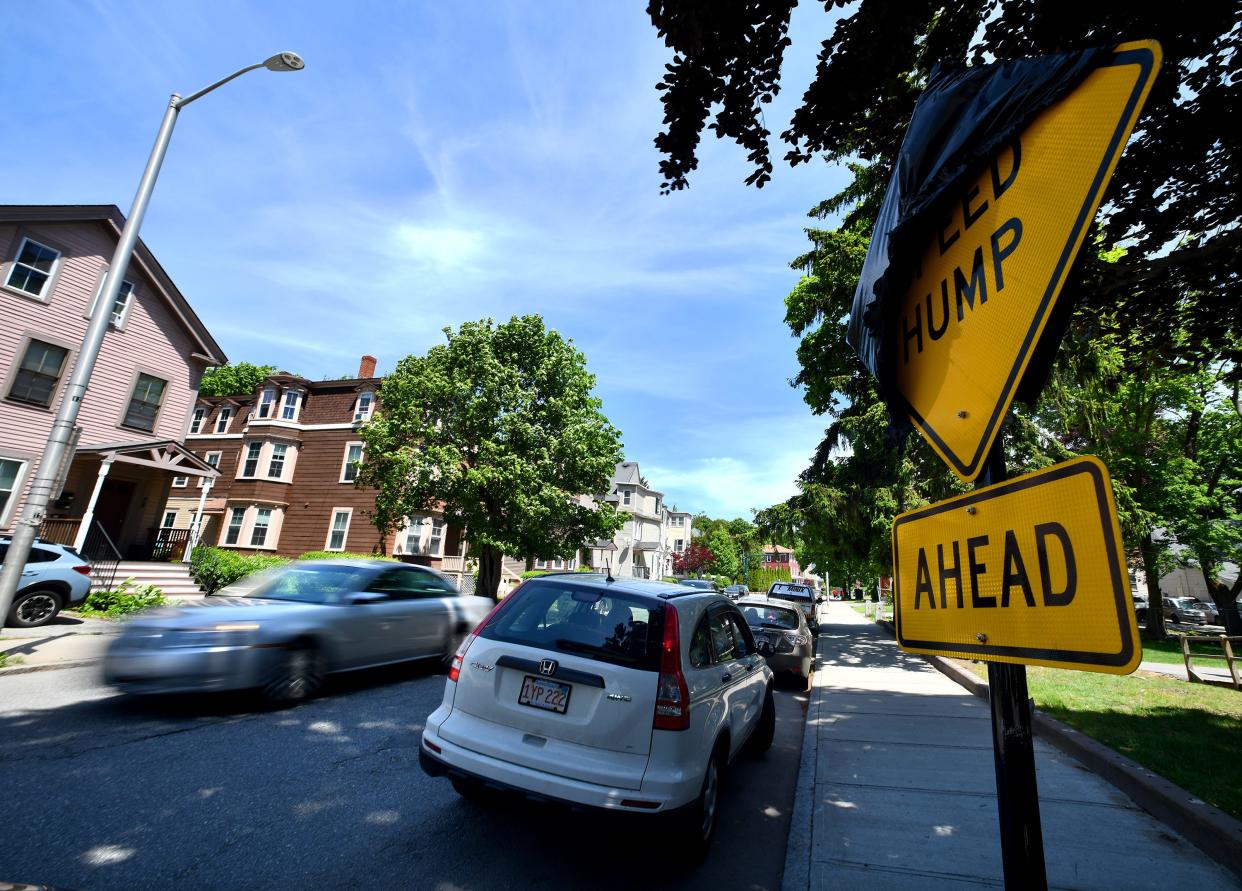 Speed humps will return and signs warning motorists of their presence on Woodland Street will soon be uncovered.