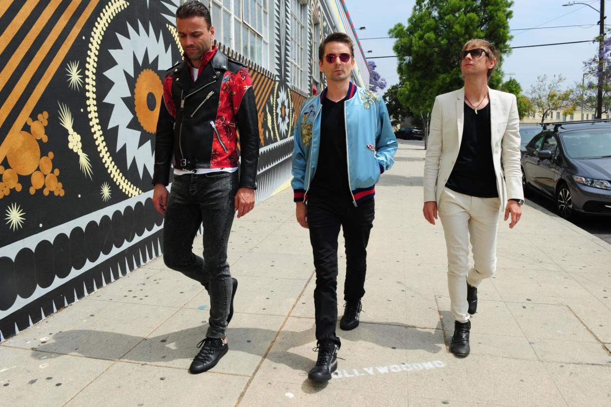 World at their feet: Muse have a virtually non-stop touring schedule