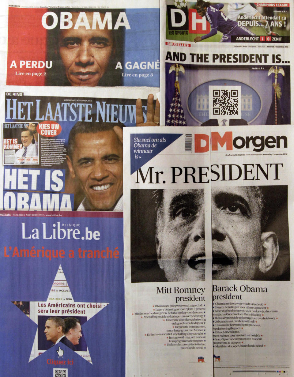 A spread of Belgian newspapers is shown in Brussels on the morning after the U.S. elections, Wednesday, Nov. 7, 2012. Faced with U.S. election results coming after printing deadlines, Belgian newspapers found novel ways around the problem. Het Laatste Nieuws, middle left, produced two front pages, asking readers to "pick your cover." One was headlined "It's Obama" while another, folded inside, read "It's Romney." De Morgen, bottom right, cut its front page in half, with one side saying "Mitt Romney President" and the other "Barack Obama President." On the Romney side it said "Please turn quickly if Obama is the winner." Le Soir's front page, top left, screamed "Obama," followed on the left with "Has Lost ,read page 2" and on the right "Has Won, read page 3." Sports newspaper La Derniere Heure, top right, left the face blank and instead provided a scan code to download the winner onto a cellphone. (AP Photo/Virginia Mayo)