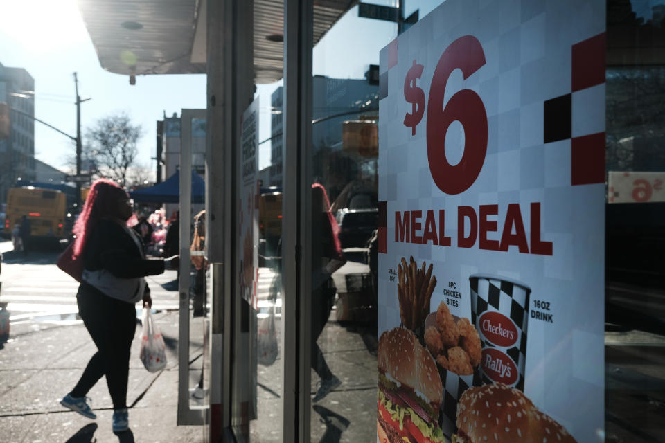 NEW YORK, NEW YORK - FEBRUARY 14: Meal prices are displayed in a window of a Brooklyn fast food restaurant on February 14, 2023 in New York City. The Dow was down in morning trading following news that the January consumer price index (CPI) report showed that inflation grew at a 6.4% annual rate, which was slightly higher than expected. (Photo by Spencer Platt/Getty Images)