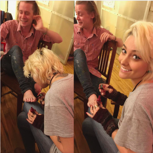 <p>The most famous photo of them to date, however, is the shot of Paris giving Mac a pedicure in December. “Model?” she wrote. “Nah I paint hipsters toenails for a living.” At the time she was visiting NYC, so she was probably <a rel="nofollow" href="https://www.yahoo.com/celebrity/macaulay-culkins-apartment-is-the-best-place-to-210132665.html" data-ylk="slk:at his crazy loft;elm:context_link;itc:0;sec:content-canvas;outcm:mb_qualified_link;_E:mb_qualified_link;ct:story;" class="link  yahoo-link">at his crazy loft</a>. She later deleted the photo, but it lives on on the Internet. (Photo: Paris Jackson via Instagram) </p>
