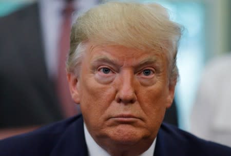 FILE PHOTO: U.S. President Trump participates in executive order signing ceremony on plan to create affordable housing council at White House in Washington