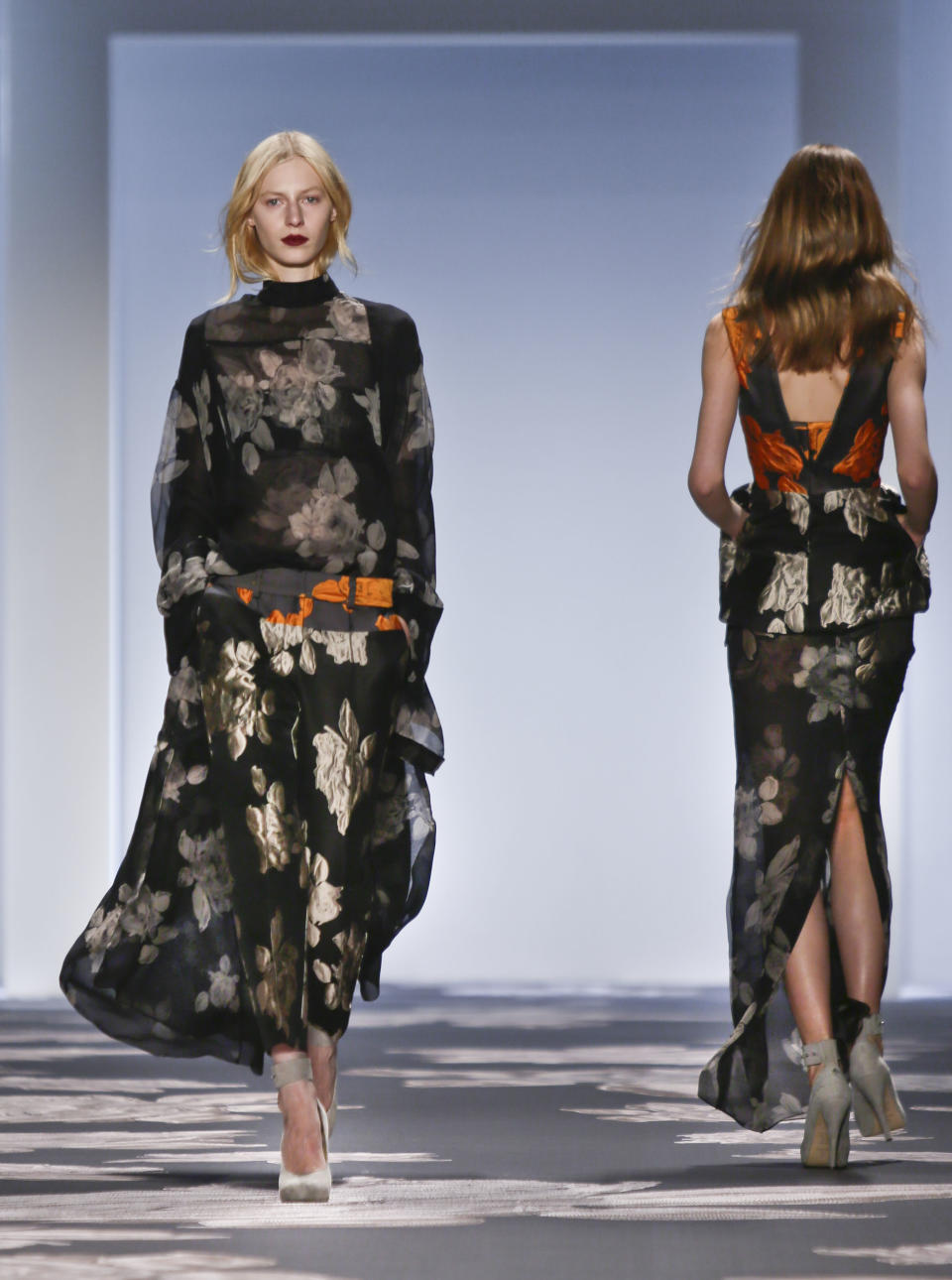 Fashion from the Vera Wang Fall 2013 collection is modeled on Tuesday, Feb. 12, 2013 in New York. (AP Photo/Bebeto Matthews)