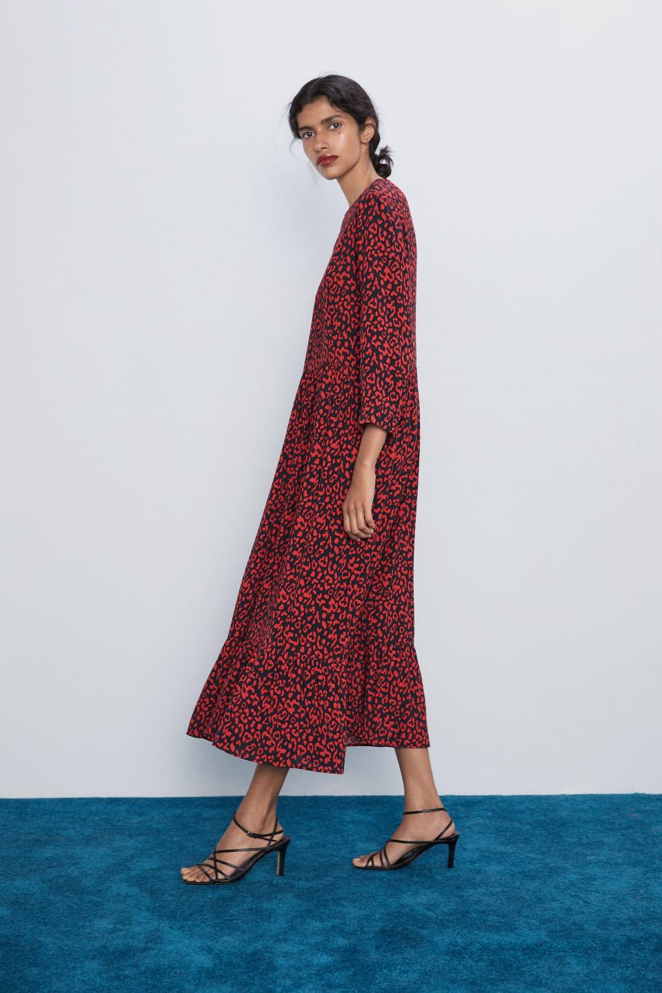 The printed dress comes in a bold shade of red and costs £49.99 [Photo: Zara]