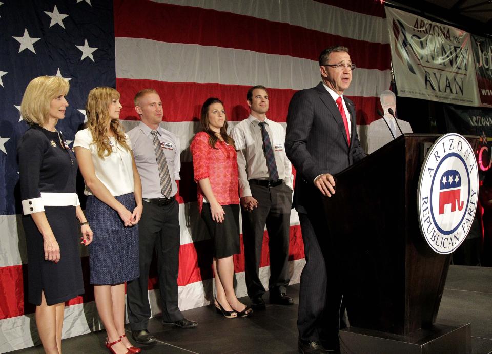 Newly-elected U.S. Rep. Matt Salmon speaks to the crowd during an election night party, Tuesday, Nov. 6, 2012, at a hotel in Phoenix. (AP Photo/Matt York) 