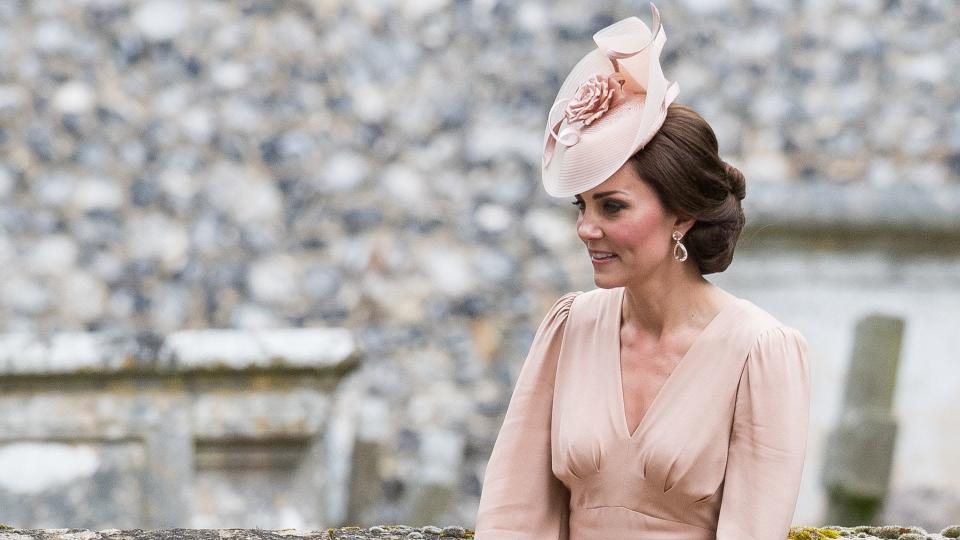 Kate Middleton wearing a pale pink dress 