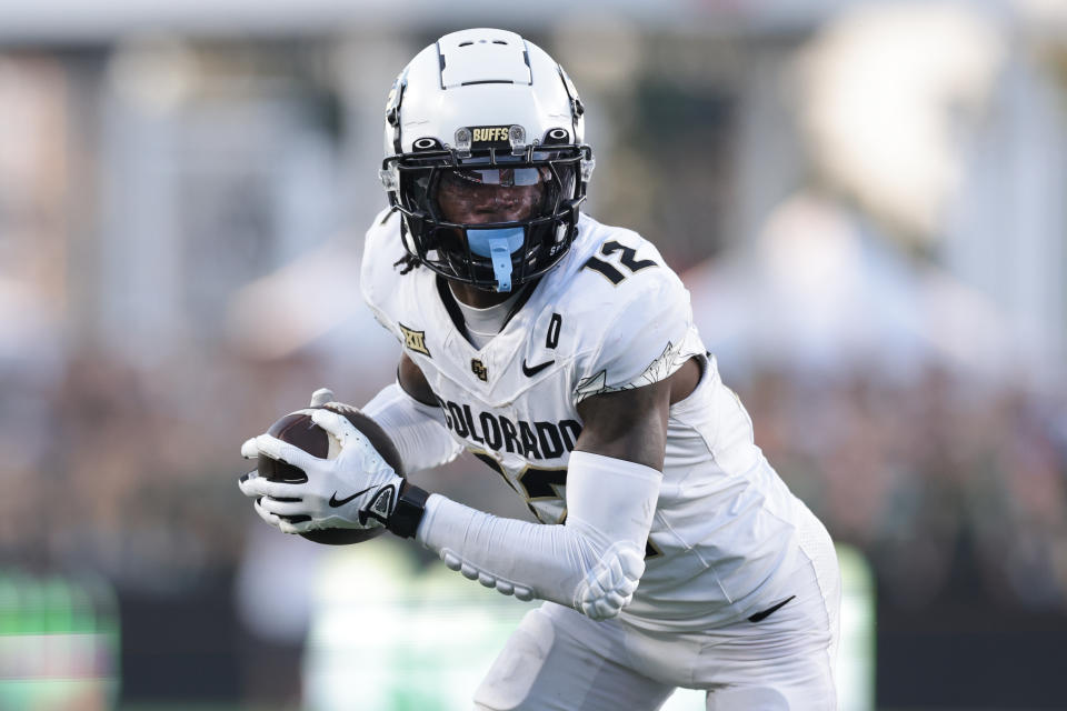 FORT COLLINS, COLORADO - SEPTEMBER 14: Travis Hunter #12 of the Colorado Buffaloes runs with the ball during the second quarter against the Colorado State Rams at Canvas Stadium on September 14, 2024 in Fort Collins, Colorado. (Photo by Andrew Wevers/Getty Images)