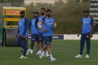 India's Virat Kohli, center, and teammates attend a practice session ahead of the Asia Cup, in Dubai United Arab Emirates, Friday, Aug. 26, 2022. India will play their opening match against Pakistan on Aug. 28. (AP Photo/Anjum Naveed)