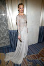 <p>For the evening, Sims chose a this beaded silver gown from Lorena Sarbu, edging out the ethereal look with a vampy lip.</p>