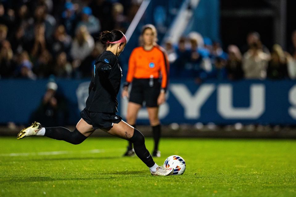 Brigham Young University forward Brecken Mozingo (13) shoots a penalty kick during the Sweet 16 round of the NCAA College Women’s Soccer Tournament against Michigan State at South Field in Provo on Saturday, Nov. 18, 2023. | Megan Nielsen, Deseret News