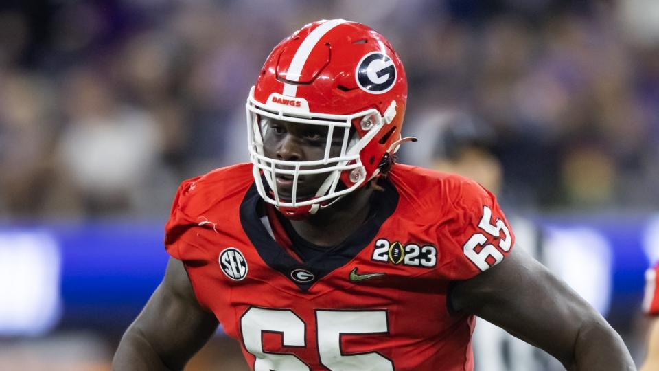 Jan 9, 2023; Inglewood, CA, USA; Georgia Bulldogs offensive lineman Amarius Mims (65) against the TCU Horned Frogs during the CFP national championship game at SoFi Stadium. Mandatory Credit: Mark J. Rebilas-USA TODAY Sports