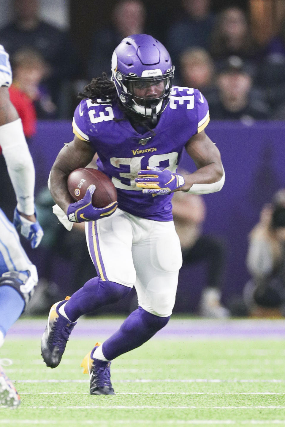 Minnesota Vikings running back Dalvin Cook (33) carries the ball in an NFL game against the Detroit Lions, Sunday, Dec. 8, 2019 in Minneapolis. The Vikings defeated the Lions 20-7. (Margaret Bowles via AP)