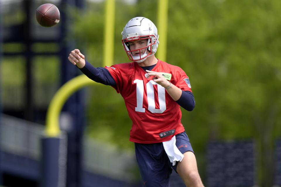 New England Patriots quarterback Drake Maye passes the ball during an NFL football practice, Monday, May 20, 2024, in Foxborough, Mass. (AP Photo/Steven Senne)