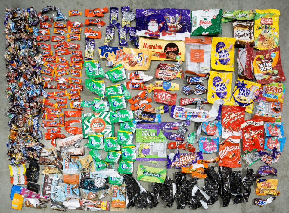 Chocolate and sweet wrappers saved over a year by Mr Webb. (PA)