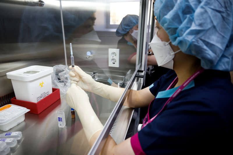 FILE PHOTO: A nurse takes part in the coronavirus disease (COVID-19) vaccination mock drill at the COVID-19 vaccination center in Seoul