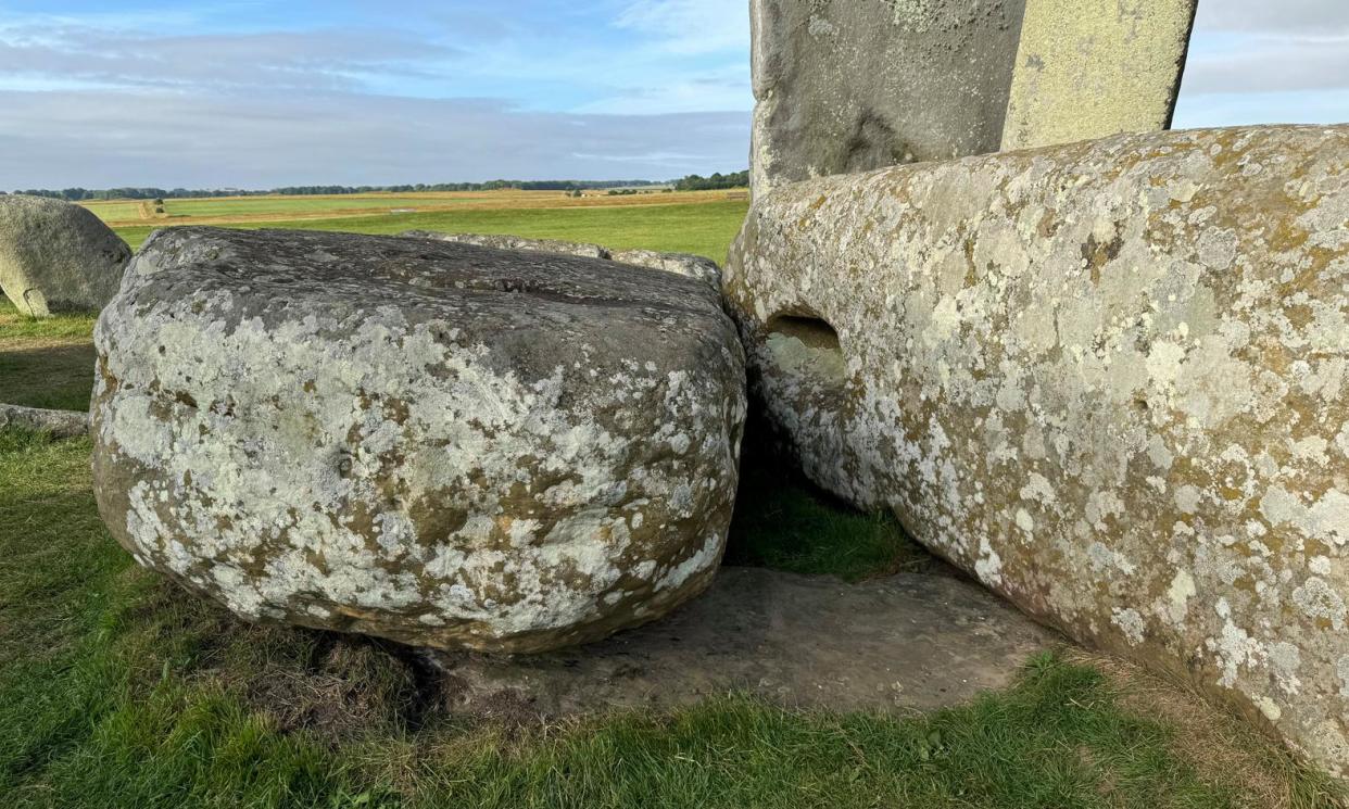 <span>The Stonhenge altar stone lies flush with the ground, hidden beneath two fallen sarsen stones.</span><span>Photograph: Mike Pitts</span>