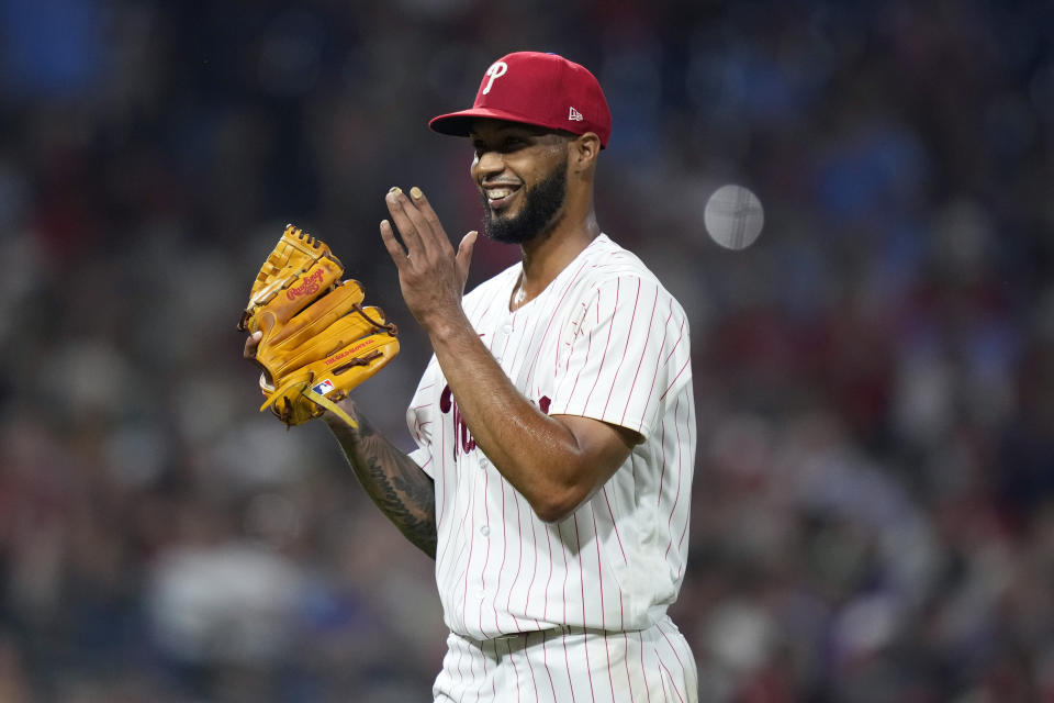 Philadelphia Phillies pitcher Cristopher Sanchez reacts after Minnesota Twins' Kyle Farmer grounded out during the sixth inning of a baseball game, Friday, Aug. 11, 2023, in Philadelphia. (AP Photo/Matt Slocum)