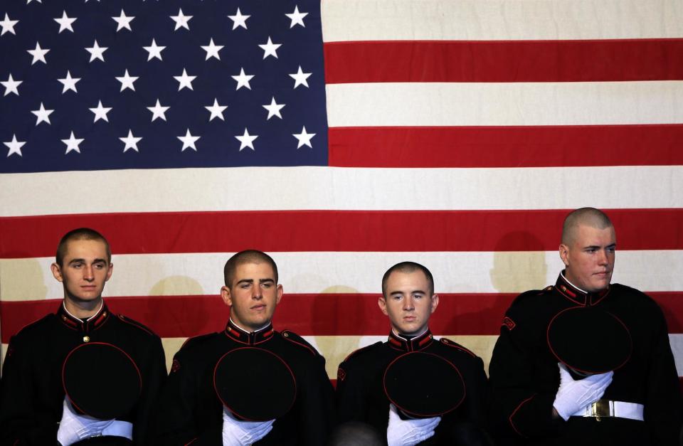 Cadets wait to take their seats before a campaign rally for Republican presidential candidate, former Massachusetts Gov. Mitt Romney at the Valley Forge Military Academy, Friday, Sept. 28, 2012, in Wayne, Pa.. (AP Photo/Matt Slocum)