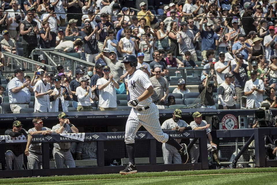 New York Yankees' DJ LeMahieu (26) heads for home after hitting a grand slam in the second inning of a baseball game against Chicago White Sox, Saturday, May 21, 2022, in New York. (AP Photo/Bebeto Matthews)