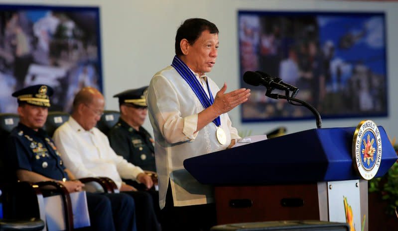 Philippines President Rodrigo Duterte gestures as he delivers a speech during the 70th Philippine Air Force (PAF) anniversary at Clark Air Base in Angeles city north of Manila, Pampanga province, Philippines July 4, 2017.  REUTERS/Romeo Ranoco