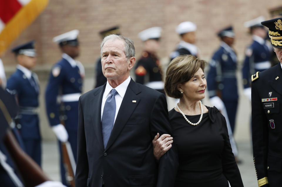 Former President George W. Bush and his wife, Laura Bush, leave St. Martin’s Episcopal Church in Houston after the funeral service for his father, former President George H.W. Bush on Thursday, Dec. 6, 2018. (Photo: Gerald Herbert/AP)