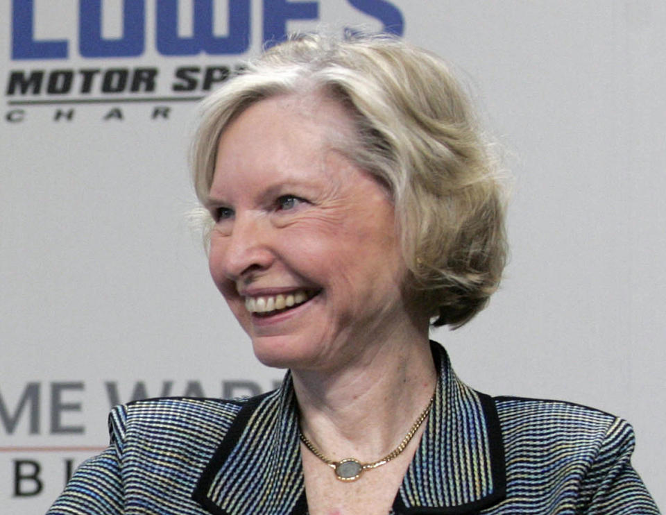 FILE - Janet Guthrie smiles during a press conference at Lowe's Motor Speedway in Concord, N.C., May 9, 2006. Guthrie will be inducted into the NASCAR Hall of Fame on Friday night, Jan. 19, 2024, as recipient of the Landmark Award that honors “significant contributions to the growth and esteem of NASCAR.” (AP Photo/Rusty Burroughs, File)