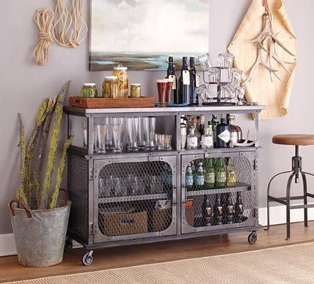 The Industrial Bar Industrial furniture’s all the rage – hence why it’s used in so many restaurants and bars. And this metal drinks cabinet shows that it doesn’t have to look out of place in a home filled with soft colours and furnishings.