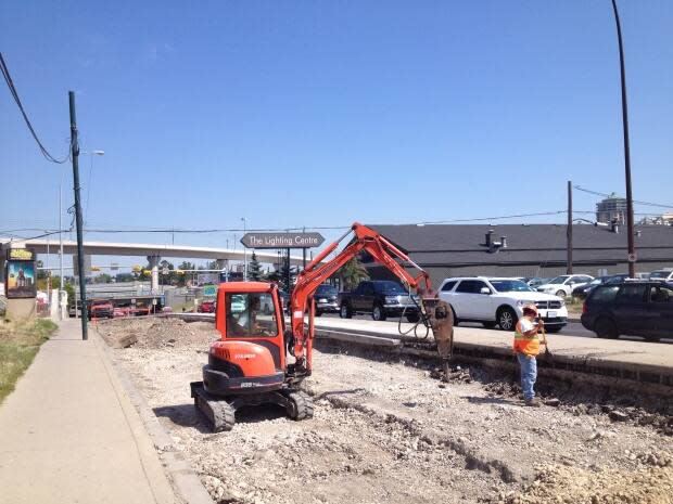 This photo from 2014 shows construction on 14th Street in Calgary's southwest. Almost all the waste from transportation construction projects is diverted away from landfills, according to a tracking system in place for the past nine years. (Rachel Maclean/CBC - image credit)