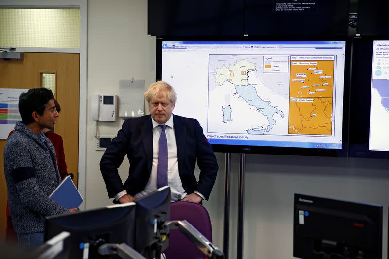 Britain's Prime Minister Boris Johnson visits the command centre at the Public Health England National Infection Service in Colindale, north London, Britain