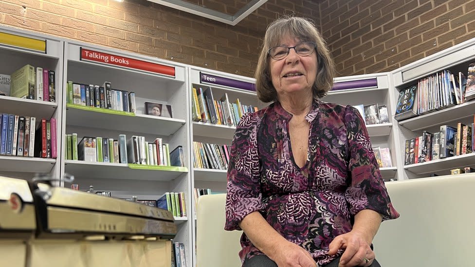 Carol Febry in the library
