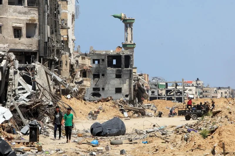 Palestinians endeavor to salvage usable items following months of Israeli bombardment in Khan Yunis. Photo by Ismael Mohamad/UPI