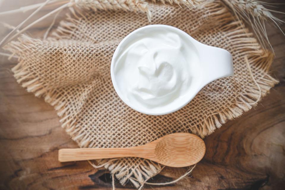 healthy breakfast with fresh greek yogurt on background