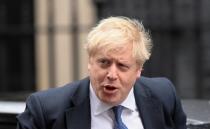 Britain's Prime Minister Boris Johnson arrives at Downing Street in London