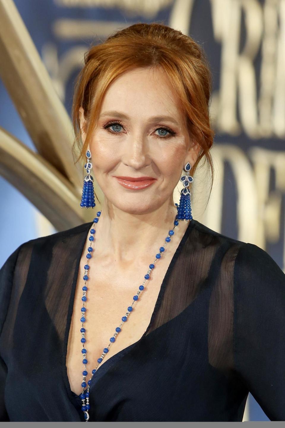 Stunning: Rowling wowed fans with her chic look (Dave Benett)