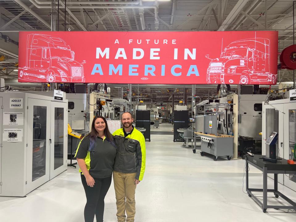 Volvo Group Trucks employees Breanna Jordan and Steven Fagert stand in the Hagerstown factory before the president’s scheduled tour on October 7, 2022. Fagert said the factory is transitioning from producing diesel to electric components for trucks.