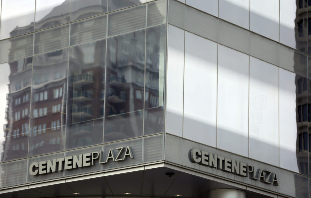 A silver and white building saying Centene Plaza