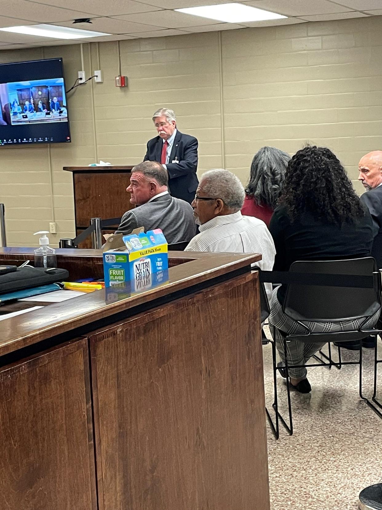 Attorney Cliff Strider speaks before the Louisiana Board of Pardons on Wednesday as Rapides Parish District Attorney Phillip Terrell (left) and others involved with the case of Larry Roy watch. Strider was the prosecutor in the 1993 trial that ended with Roy sentenced to death for the 1993 murders of two Cheneyville residents. His attempt at clemency was rejected by the board.