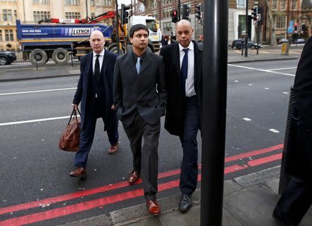 Navinder Sarao (C) arrives at Westminster Magistrates' Court for an extradition hearing in London, Britain February 4, 2016. The London-based trader accused by U.S. authorities of helping to cause the 2010 Wall Street "flash crash" by spoofing the markets appeared in court on Thursday to try to block his extradition to the United States. REUTERS/Peter Nicholls