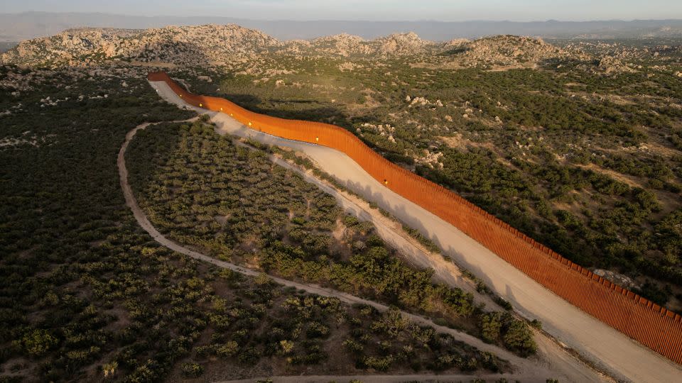 A drone view shows the US-Mexico border wall in Jacumba Hot Springs, California, on June 3. - Go Nakamura/Reuters