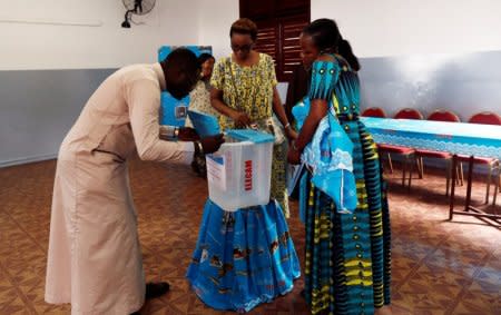 Electoral workers prepare the polling station where President Paul Biya will cast his ballot in Sunday's presidential election in Yaounde, Cameroon October 6, 2018. REUTERS/Zohra Bensemra