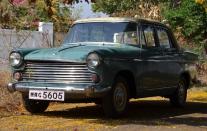 <b>Car:</b> Morris Oxford <br><b>Year:</b> 1954<br><b>Owner:</b> Almeida<br><br>The car belonged to a certain Almeida from Mumbai, who was the father of a good friend of Sulaiman’s. During a visit to Banglaore Almeida discovered Sulaiman’s interest in classic cars and mentioned that he had a car in Bombay. On inspection Sulaiman found that the car was in great shape but was never used for years and had to be overhauled, and the rust and chrome to be redone. “Though this car is not a 'classic’ it is unique because it is a single owner with original paint and upholstery and he also had a lot of spares with original owners' manual. The car was his prized possession in Kenya where he worked as a senior Bank official. Great car for any one starting a collection,” remarks Sulaiman.